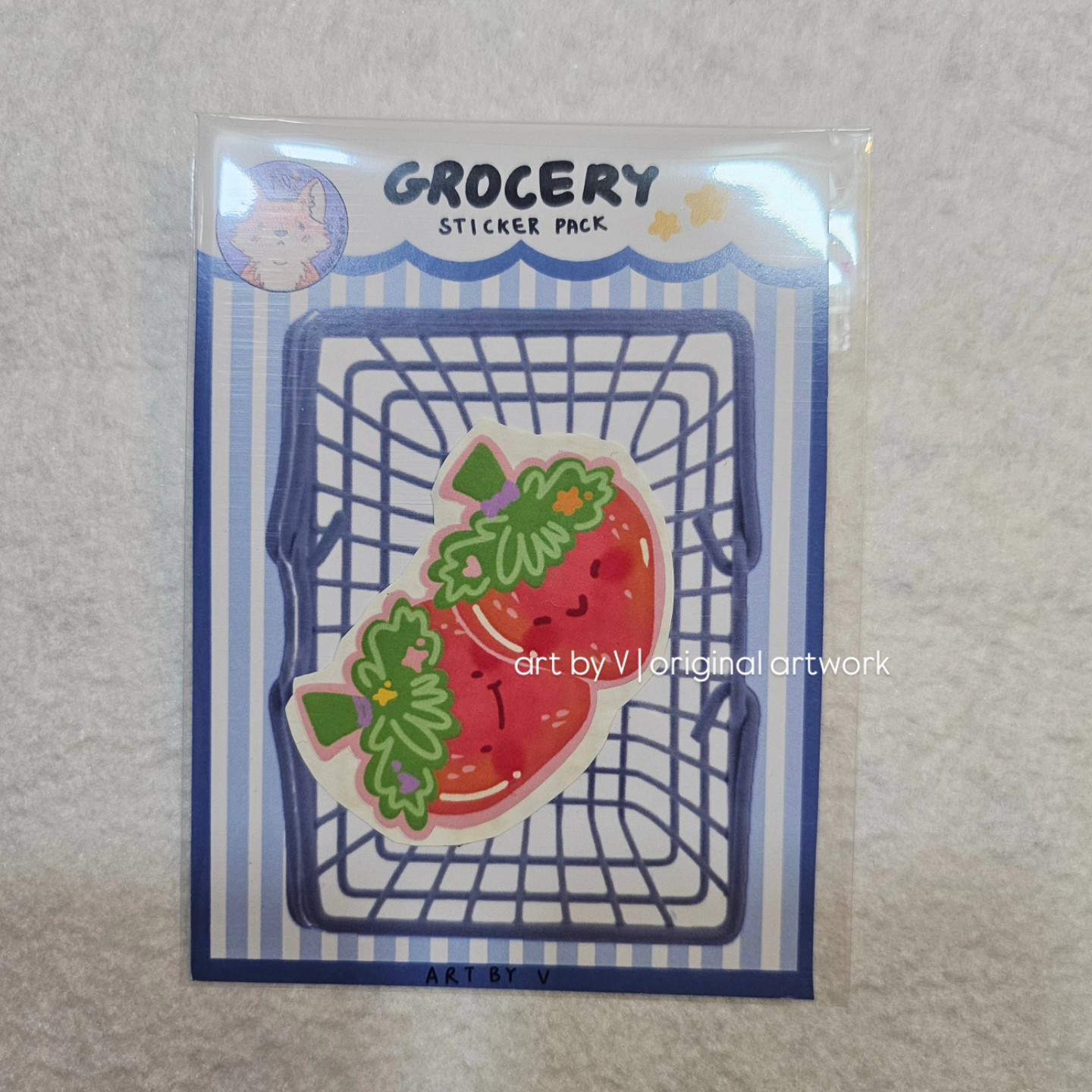 Strawberry stickers in grocery-themed packaging