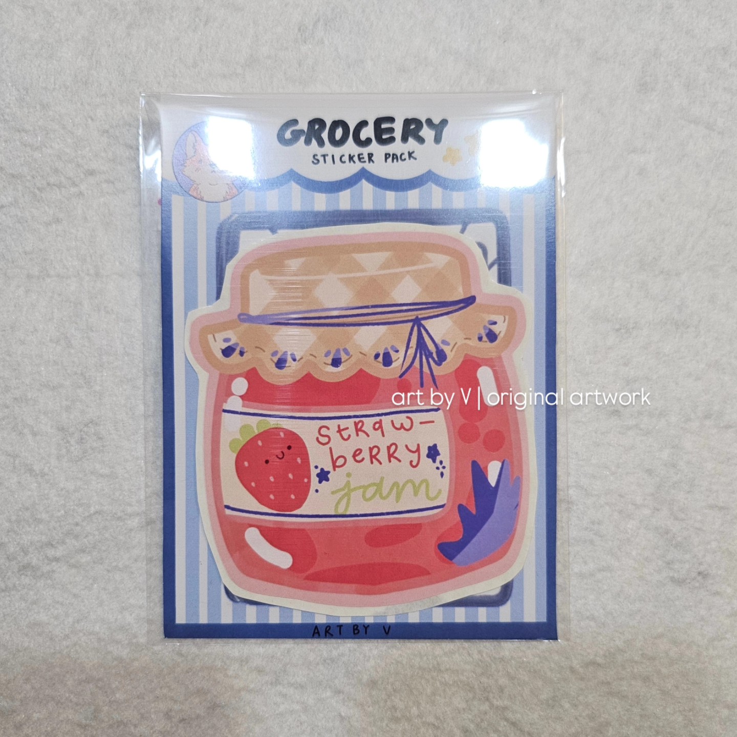 Strawberry jam jar sticker in grocery-themed packaging