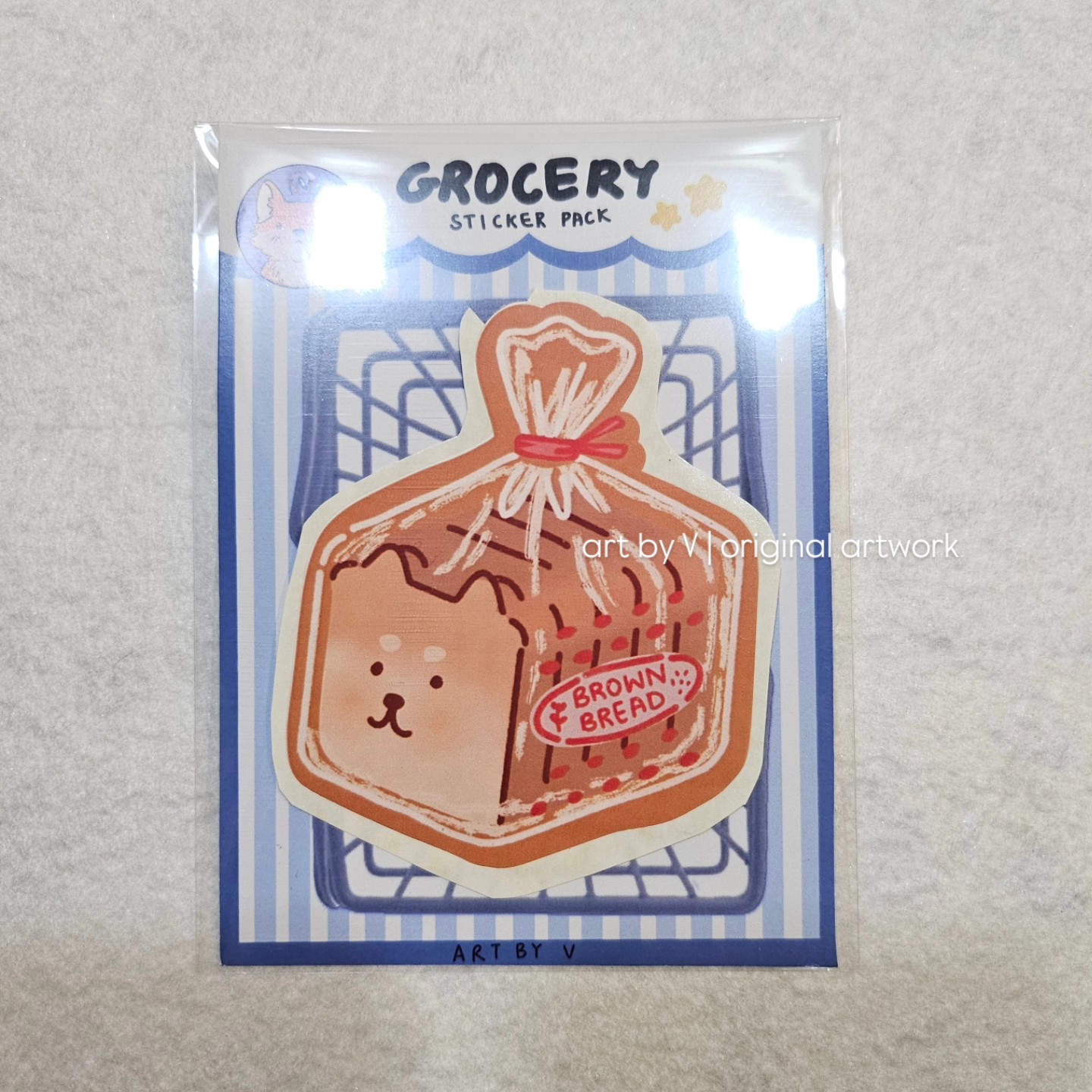 Bread loaf sticker in grocery-themed packaging