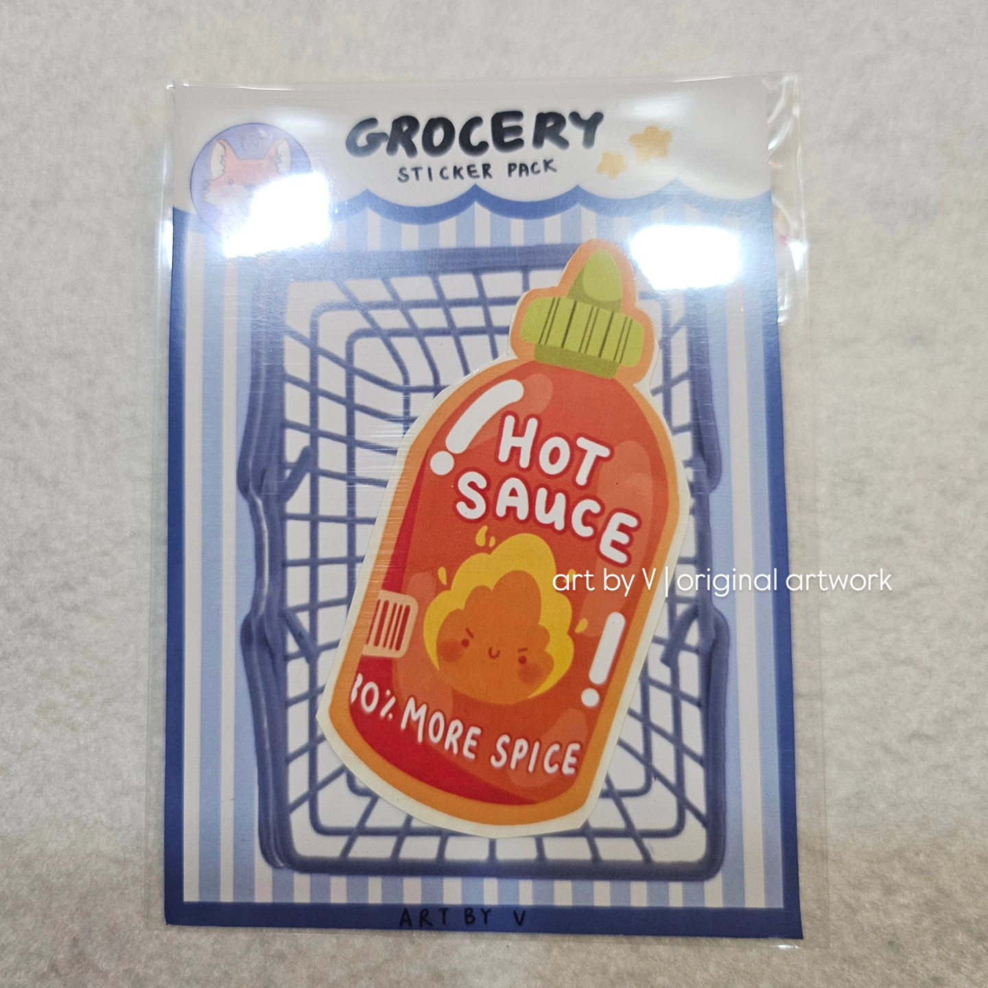 Hot sauce bottle sticker in grocery-themed packaging